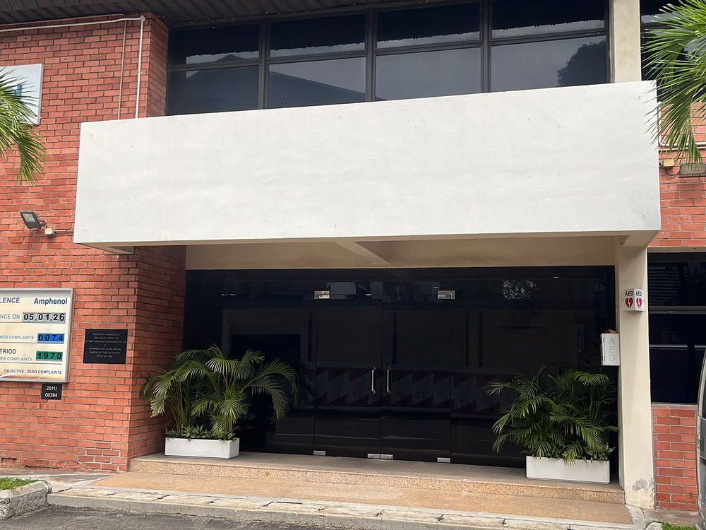 Blank signboard before installation, Amphenol Singapore