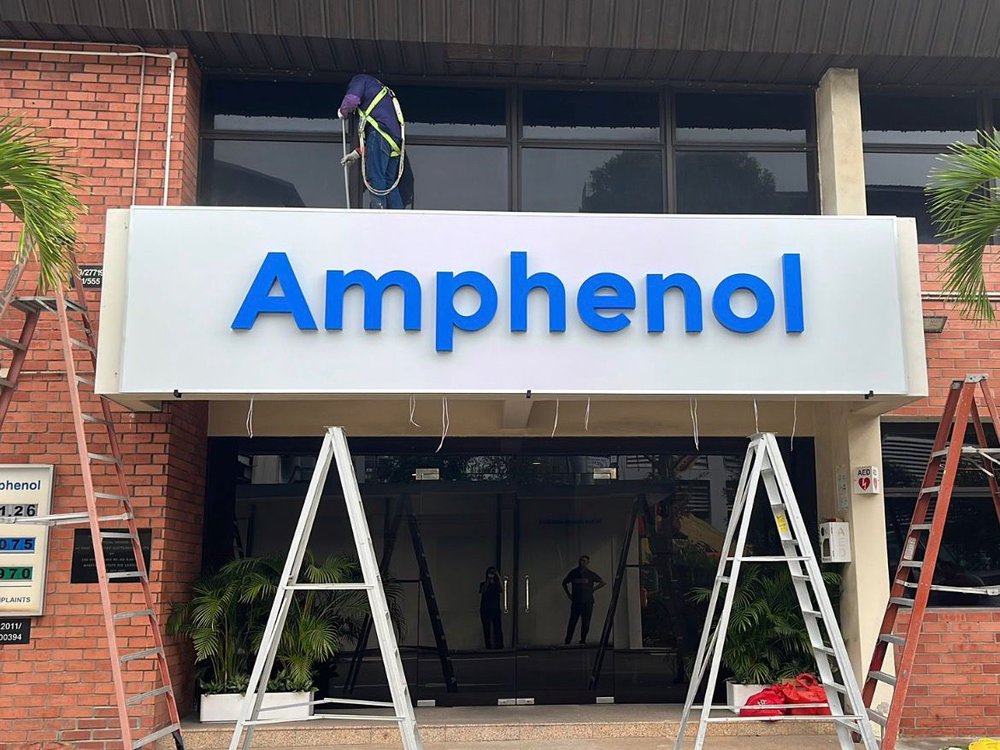 Final wiring and installation of LED signboard, Amphenol Singapore